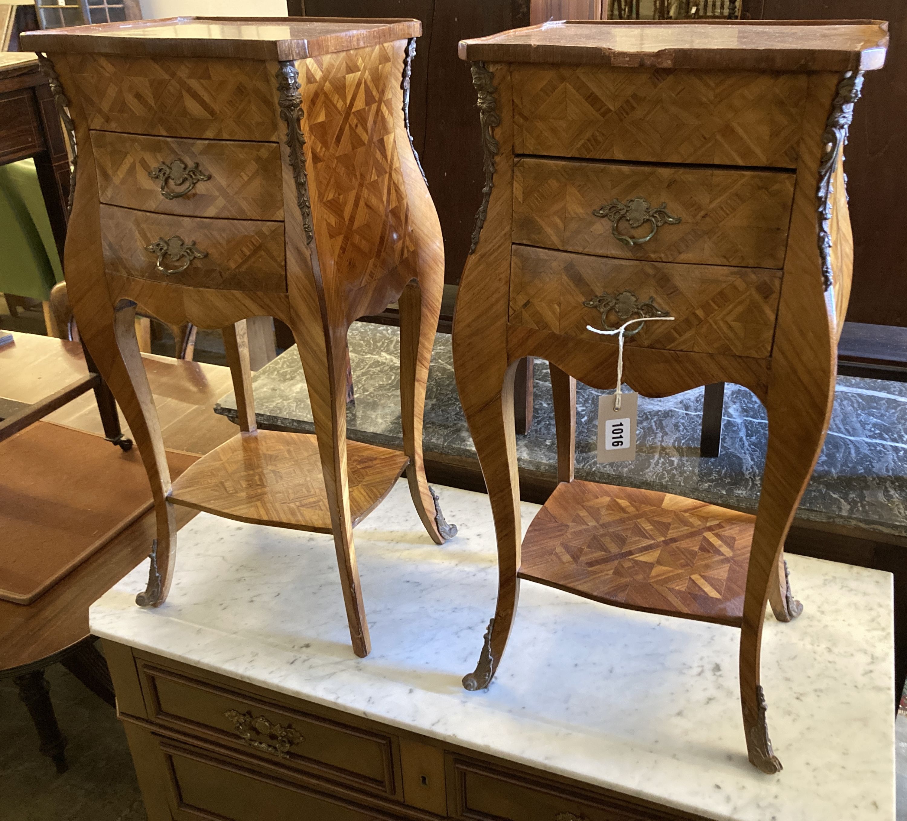 A pair of Louis VIX style parquetry and inlaid kingwood petit commodes (damage), width 34cm, depth 28cm, height 69cm